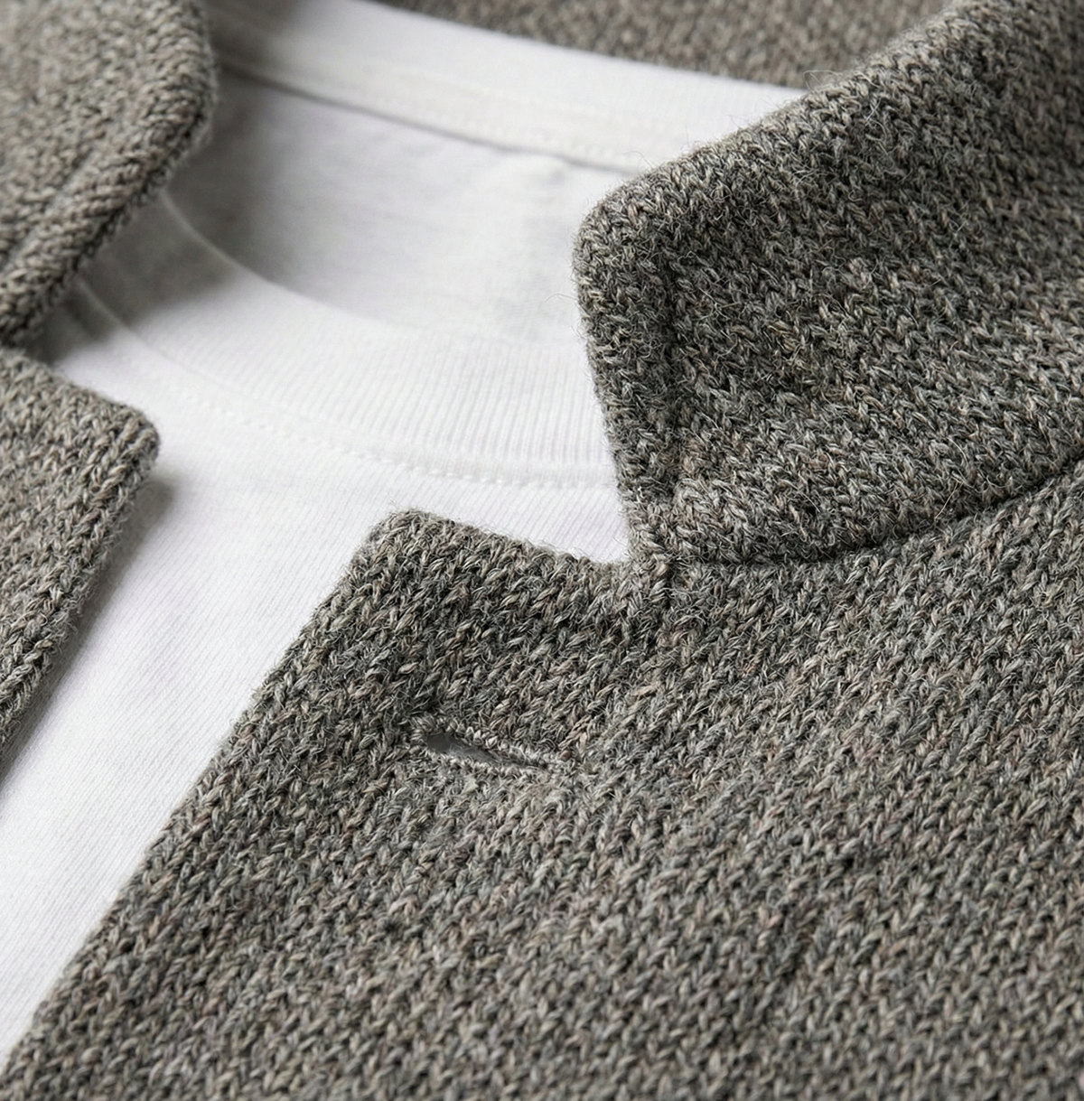 Men's textured knit blazer with stand collar, button front and patch pockets